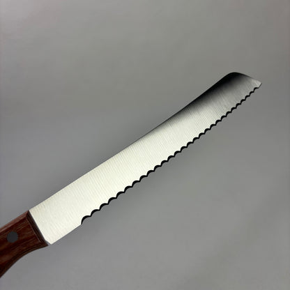 Brand new Japanese Bunmei Yoshikin Bread Knife. 260mm (Stainless Steel) with original package